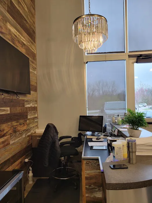 The Body Lab - A Lagree Fitness Studio · Yoga · Barre · Mat pilates · Total body burn · Red light therapy saunas Picture 6