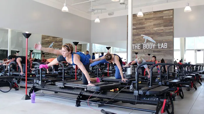 The Body Lab - A Lagree Fitness Studio · Yoga · Barre · Mat pilates · Total body burn · Red light therapy saunas Picture 1